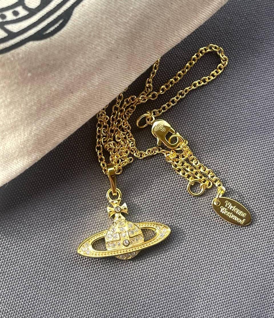 Vivienne westwood gold necklace - Etsy 日本