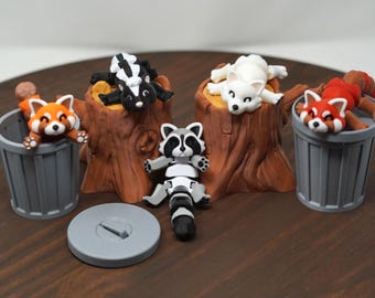 Articulated 3D Printed Animal Fidget Toy, features movable joints: Raccoon, Panda, Skunk, Fox.