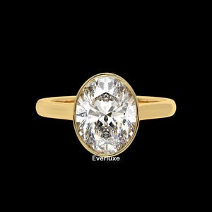 2 Carat Oval Lab Grown Diamond Ring: Bezel Set Solitaire, Split Shank