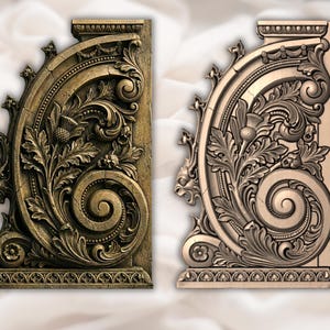 May include: Two ornate architectural corbels with detailed relief carvings. One is a bronze color, the other is a lighter beige. The designs feature swirling patterns, leaves, and floral elements, with a decorative base and top.