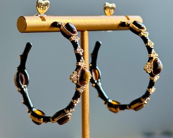 Tijgeroog oorbellen kristal goudkleurige legering zwart emaille sterlingzilver stift
