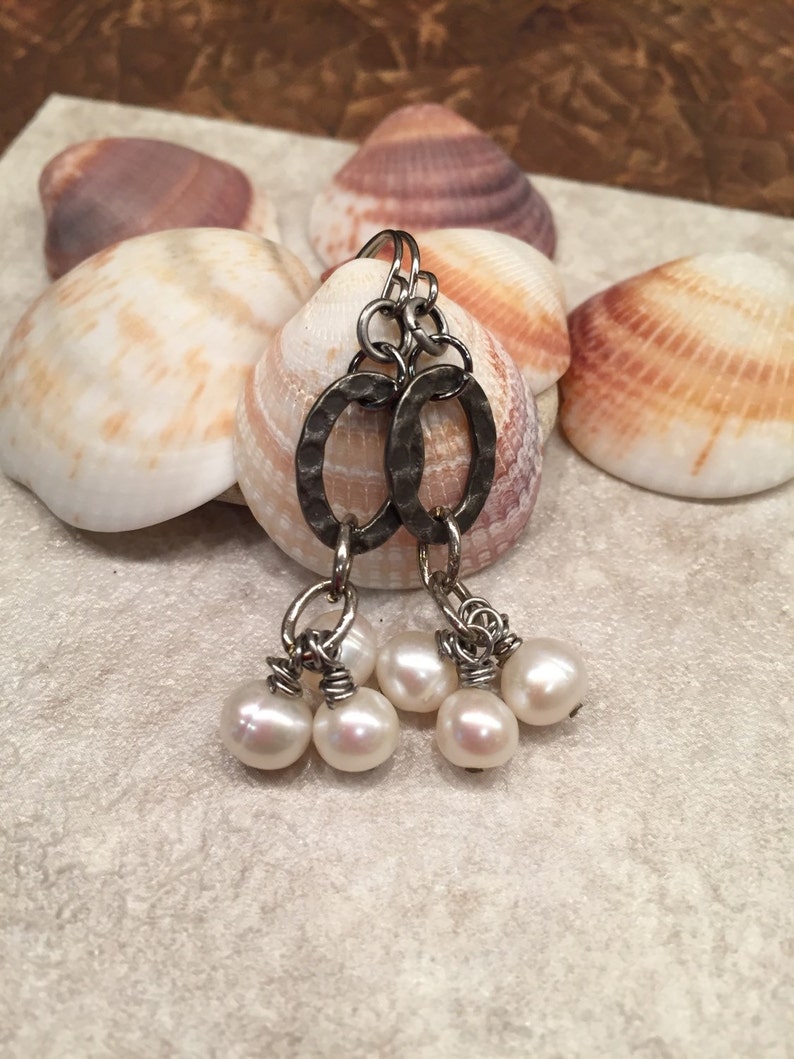 Cluster of dangling pearls fabulous feminine fashion affordable statement earrings