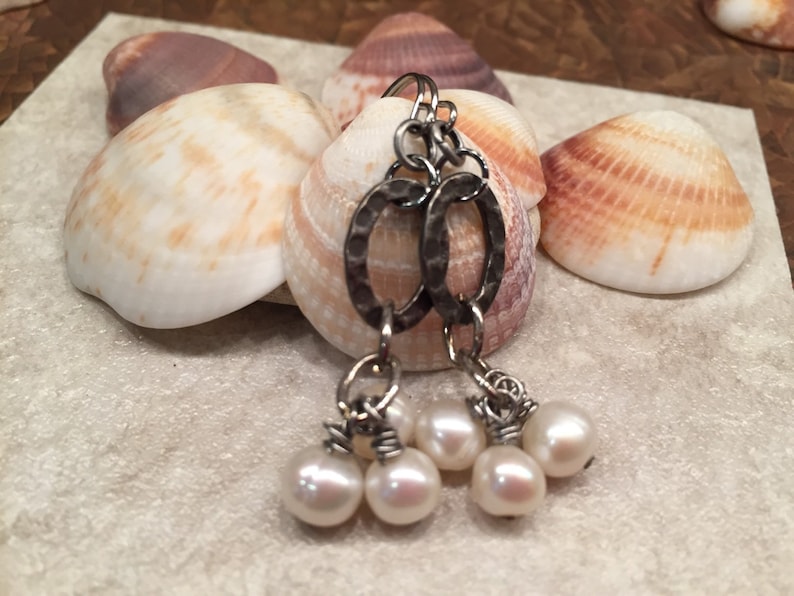 Cluster of dangling pearls fabulous feminine fashion affordable statement earrings