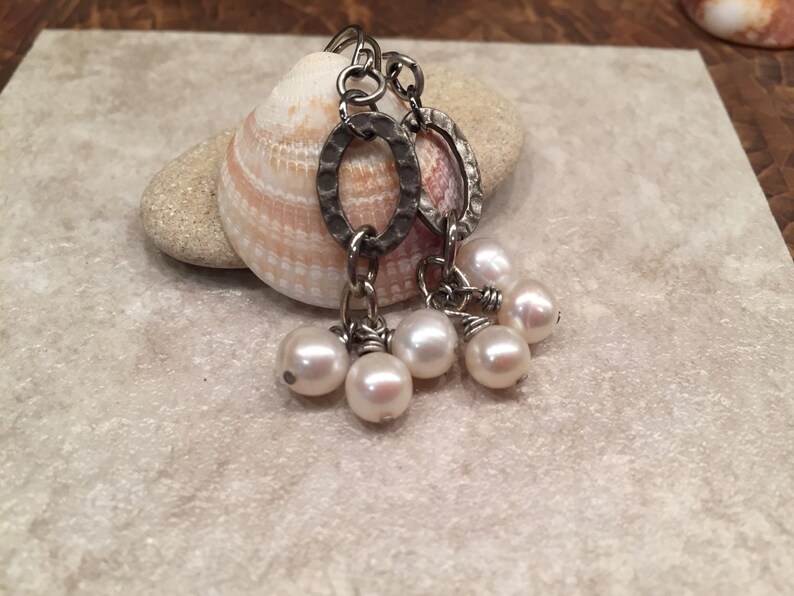 Cluster of dangling pearls fabulous feminine fashion affordable statement earrings