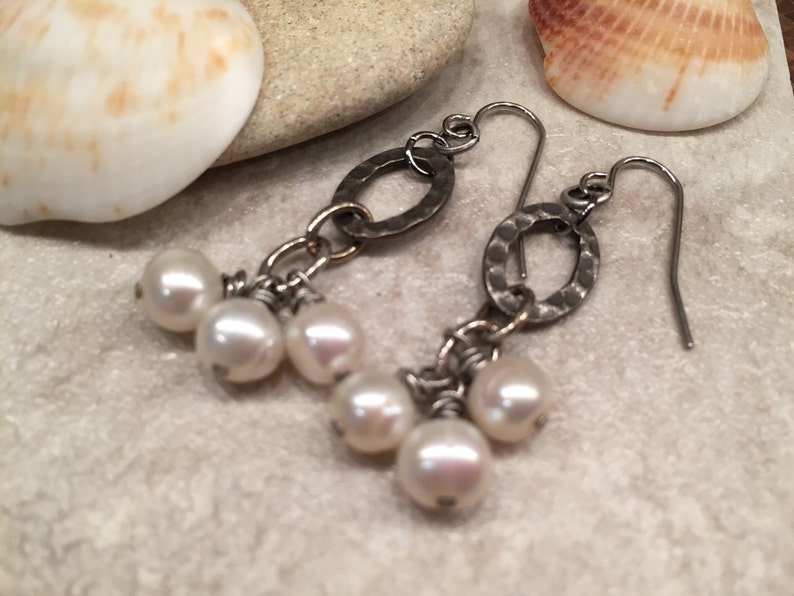 Cluster of dangling pearls fabulous feminine fashion affordable statement earrings