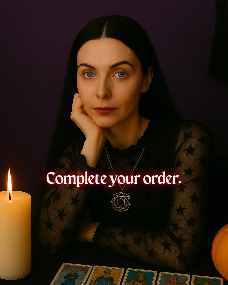 May include: A woman with long black hair sits at a table with a lit candle, tarot cards, and a pumpkin. She is wearing a black shirt with stars and a geometric pendant necklace. The text "Complete your order." is displayed in red.