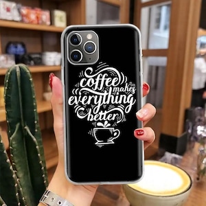 May include: Black phone case with a white design that says "coffee makes everything better" with a coffee cup graphic.