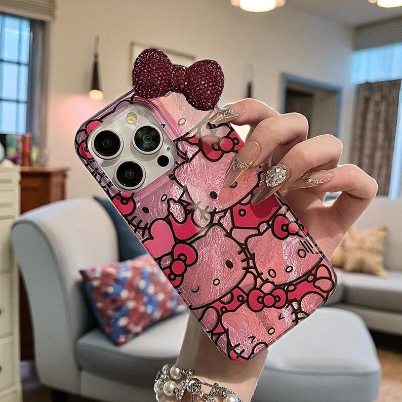 Hello Kitty iPhone Hülle: Glitzernde Hartcover-Hülle mit 3D Schleifen-Anhänger A