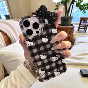 Hello Kitty iPhone Hülle: Glitzernde Hartcover-Hülle mit 3D Schleifen-Anhänger B