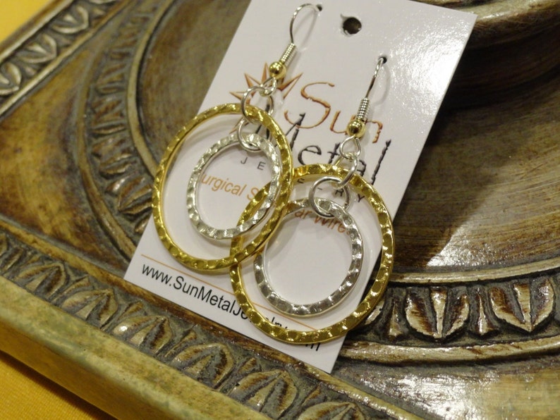 Style #342 Rings of fire gold and silver earrings
