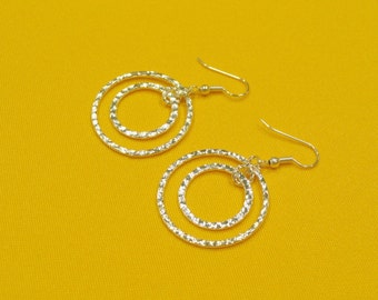 Rings of fire bright silver earrings (Style #272BS)