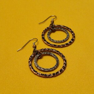 Rings of fire antique copper and silver earrings (Style #444CS)