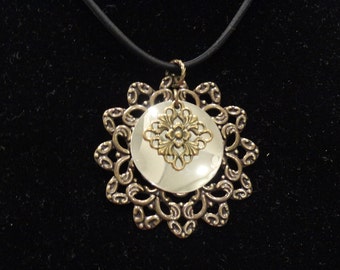 Surprise pendant in antique gold and shiny silver (Style #1345B)