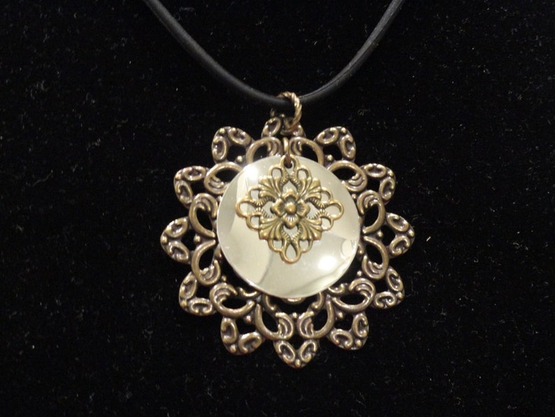 Surprise pendant in antique gold and shiny silver Style #1345B