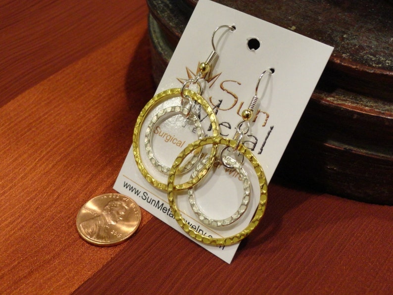 Style #342 Rings of fire gold and silver earrings