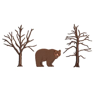 May include: A brown bear stands between two leafless trees, all rendered in a detailed embroidery style. The bear faces forward, with a textured appearance. The trees have intricate branch patterns, set against a white background.