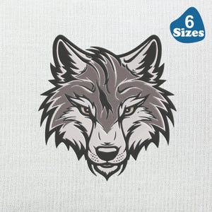 May include: A detailed black and white illustration of a wolf's head. The wolf has a fierce expression with sharp teeth and a pointed nose.