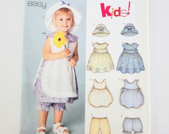 Uncut Easy New Look 6255 Babies Dress, Pinafore, Pants, Panties, Hat | Sizes Newborn, Small, Medium, Large | Vintage Sewing Pattern For Baby