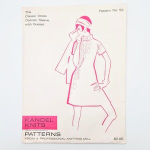 May include: Vintage sewing pattern featuring a pink illustration of a dress with a dolman sleeve and gusset. The pattern is from Kandel Knits and includes the text "The Classic Dress" and "Pattern No. 52".