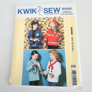 May include: Kwik Sew K4024 children's sewing pattern featuring costumes. The pattern includes designs for a police officer, firefighter, sailor, and chef. The pattern sizes are XXS-XS-S-M-L.