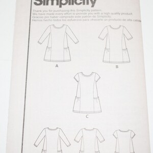 May include: Simplicity 8147 sewing pattern. The pattern features illustrations of dresses with long, three-quarter, and short sleeves, each with pockets. The text includes "Thank you for purchasing this Simplicity pattern."
