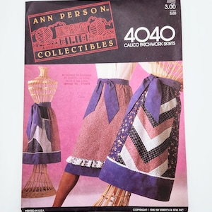 May include: A vintage sewing pattern for calico patchwork skirts by Ann Person Collectibles. The cover features illustrations of skirts with purple accents and a variety of fabric patterns. The pattern number is 4040, and it was printed in the U.S.A.