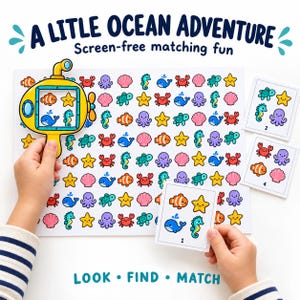 May include: A matching game titled A LITLE OCEAN ADVENTURE with a yellow submarine-shaped viewer, a large sheet filled with colorful sea creature icons, and small square cards labeled with numbers, featuring whales, crabs, and starfish.
