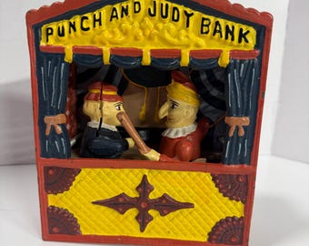 Hucha mecánica vintage de Punch y Judy / Juguete retro de colección
