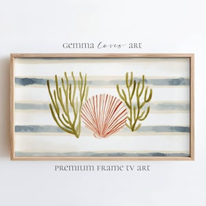 May include: Watercolor artwork in a wooden frame. The art features a seashell and seaweed in shades of red, green, and beige, set against a backdrop of blue and white horizontal stripes. The text "gemma loves art" and "PREMIUM FRAME TV art" are visible.