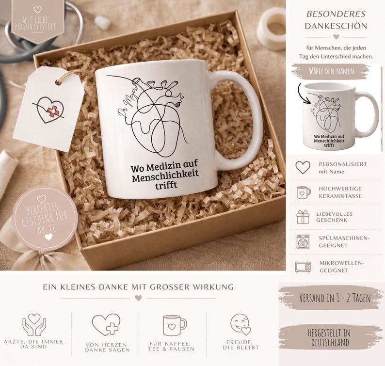 May include: White ceramic mug with a black line drawing of a heart and the text "Wo Medizin auf Menschlichkeit trifft". The mug is in a gift box with a tag that says "Perfektes Geschenk f&uuml;r &Auml;rzte".