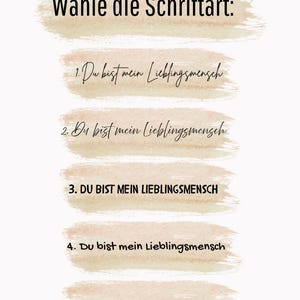 May include: An image with the text "W&auml;hle die Schriftart:" at the top, followed by five lines of text in German, each on a beige brushstroke background. The text options include variations of "Du bist mein Lieblingsmensch."