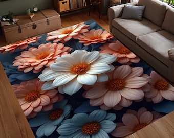 Alfombra floral moderna de gran tamaño con flores en tonos melocotón y blanco sobre un fondo azul profundo para una elegante decoración de sala de estar o dormitorio.