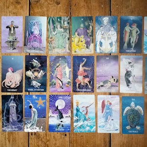 Wisdom of the Depths tarot deck - the Major Arcana, shown on a wooden floor.