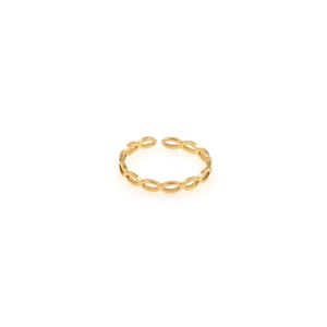 May include: A gold-toned adjustable ring with a delicate, openwork design featuring a repeating oval pattern.
