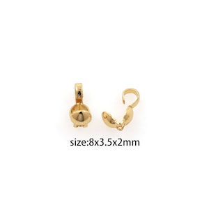 May include: Two gold-toned metal clasps for jewelry making. The clasps are 8mm long, 3.5mm wide, and 2mm thick.  Size: 8x3.5x2mm
