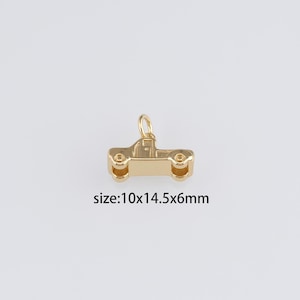 May include: Gold-toned metal charm shaped like a pickup truck. The charm is approximately 10mm wide, 14.5mm long, and 6mm thick.  size:10x14.5x6mm