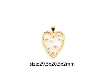 May include: Gold heart-shaped pendant with a textured edge and white pearl accents. Size: 29.5x20.5x2mm.