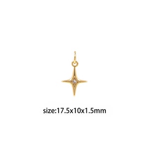 May include: A gold-colored star-shaped pendant with a small, clear gemstone in the center. The pendant has a loop at the top for attaching to a chain. The text "size:17.5x10x1.5mm" is below the pendant.