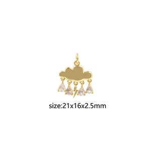May include: Gold-tone charm featuring a cloud with raindrops and a lightning bolt, accented with clear cubic zirconia stones. Size: 21x16x2.5mm.