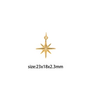 May include: Gold-toned star charm pendant with a 8-point star design. The charm measures 23mm x 18mm x 2.3mm.