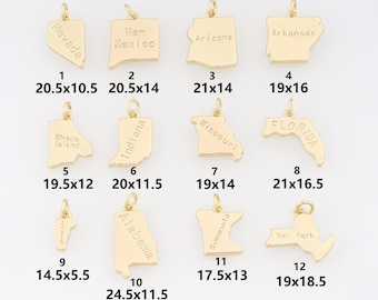 May include: Gold-colored metal charms in the shape of U.S. states, including Nevada, New Mexico, Arizona, Arkansas, Rhode Island, Indiana, Missouri, Florida, Vermont, Alabama, Minnesota, and New York. Each charm has the state name engraved.