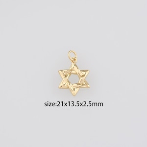 May include: A gold-colored Star of David pendant with a textured surface. The pendant has a small loop at the top for attaching to a chain. The text on the image reads: size:21x13.5x2.5mm.