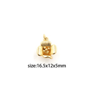 May include: Gold-toned metal flower charm with a textured surface and a loop for attaching to jewellery. The charm measures 16.5 mm x 12 mm x 5 mm.