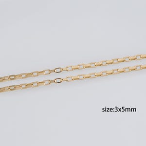 May include: Two gold chains with square links. The chains are 3mm wide and 5mm long. size:3x5mm