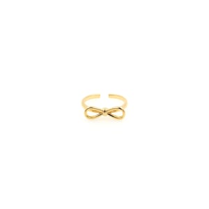 May include: A gold-toned ring with a bow design.