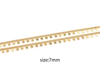May include: Gold chain with small star charms hanging from it. The chain is 7mm wide.