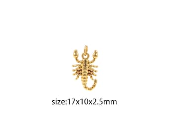 Puede incluir: Pendiente de encanto de escorpión dorado. El escorpión está detallado con un acabado texturizado y mide 1,7 x 1 x 0,25 pulgadas.