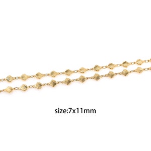 May include: Gold chain with a repeating pattern of small seashell charms. The chain is 7mm wide and 11mm long.  size:7x11mm