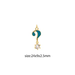 May include: Gold charm with a blue enamel question mark and a clear rhinestone. The charm is 24mm x 9mm x 2.5mm.