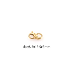 May include: Gold-toned metal lobster clasp with a size of 8.5x13.5x3mm.